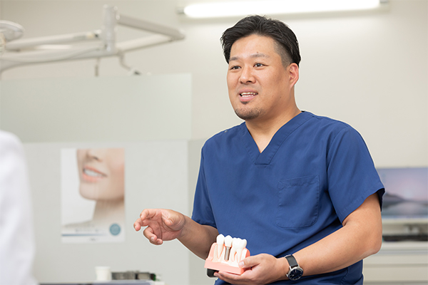 人の笑顔が進路を変えた、歯科医師としての原点